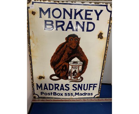 AN ENAMEL 'MONKEY BRAND MADRAS SNUFF POST BOX 555, MADRAS' ADVERTISING SIGN 