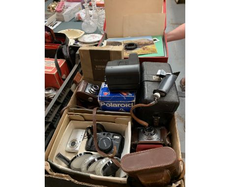 A LARGE QUANTITY OF CAMERAS AND RELATED ITEMS TO INCLUDE A CANON, POLAROID, ZEISS IKON, ILFORD SPORTSMAN, X RAY FILM ETC 