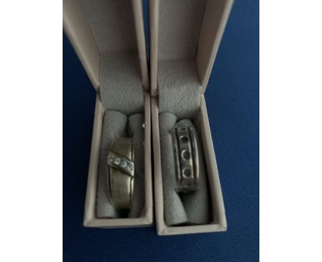 TWO SILVER BAND RINGS, ONE GOLD PLATED &amp; STONE SET 