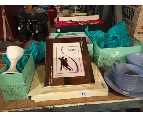 THREE NEW AND BOXED PORTMERION SETS TO INCLUDE TWO WITH PLATE, BOWL AND CUP AND ONE WITH A PAIR OF EGG CUPS AND A PHOTO FRAME
