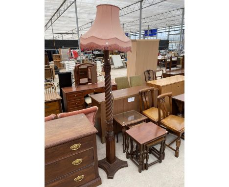 A MAHOGANY STANDARD LAMP WITH BARLEY TWIST COLUMN 