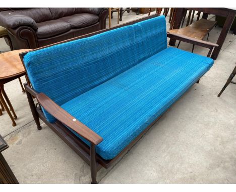 A BELIEVED GREAVES AND THOMAS RETRO TEAK SOFA (CONVERTS TO A BED) 