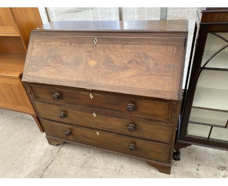 A GEORGIAN INLAID MAHOGANY BUREAU ON BRACKET FEET WITH FALL FRONT AND THREE DRAWERS WITH ONE ESCUTCHEON PLATES 