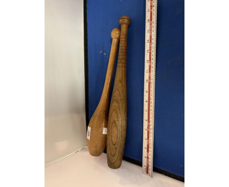 A SPALDING GOLD MEDAL BASEBALL BAT AND A WOODEN JUGGLING STICK 