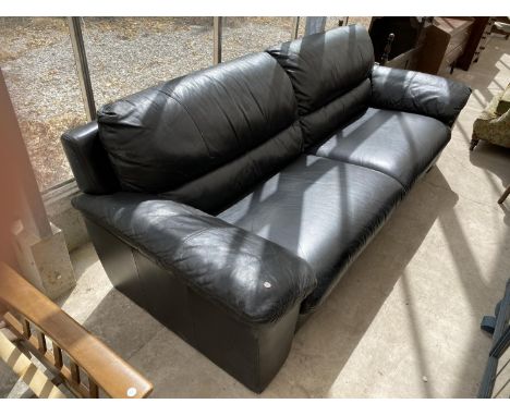 A BLACK LEATHER TWO SEATER SOFA 