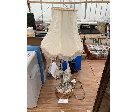 A CERAMIC PAIR OF HERONS TABLE LAMP WITH MARK  ON A WOODEN BASE 