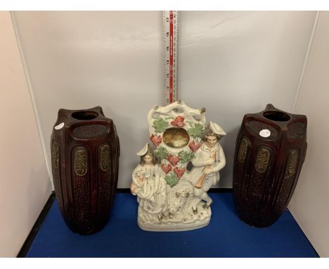 A PAIR OF BRETBY VASES AND A STAFFORDSHIRE CERAMIC FIGURE OF A LADY AND GENT WITH SPANIEL POCKET WATCH STAND 
