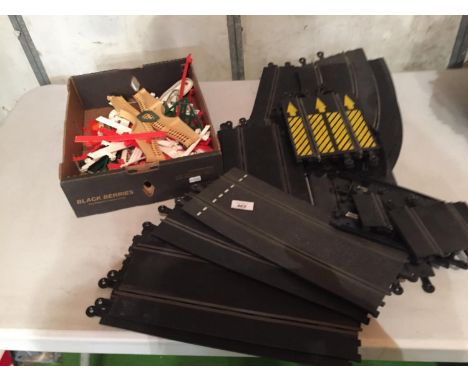 A QUANTITY OF SCALEXTRIC TRACK AND BARRIERS 