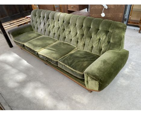 A RETRO GREEN BUTTON BACK FOUR SEATER SOFA 