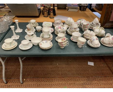 A LARGE COLLECTION OF VARIOUS CHINA TEA CUPS AND SAUCERS ETC 