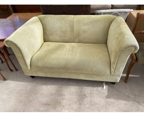 A GREEN TWO SEATER SOFA 