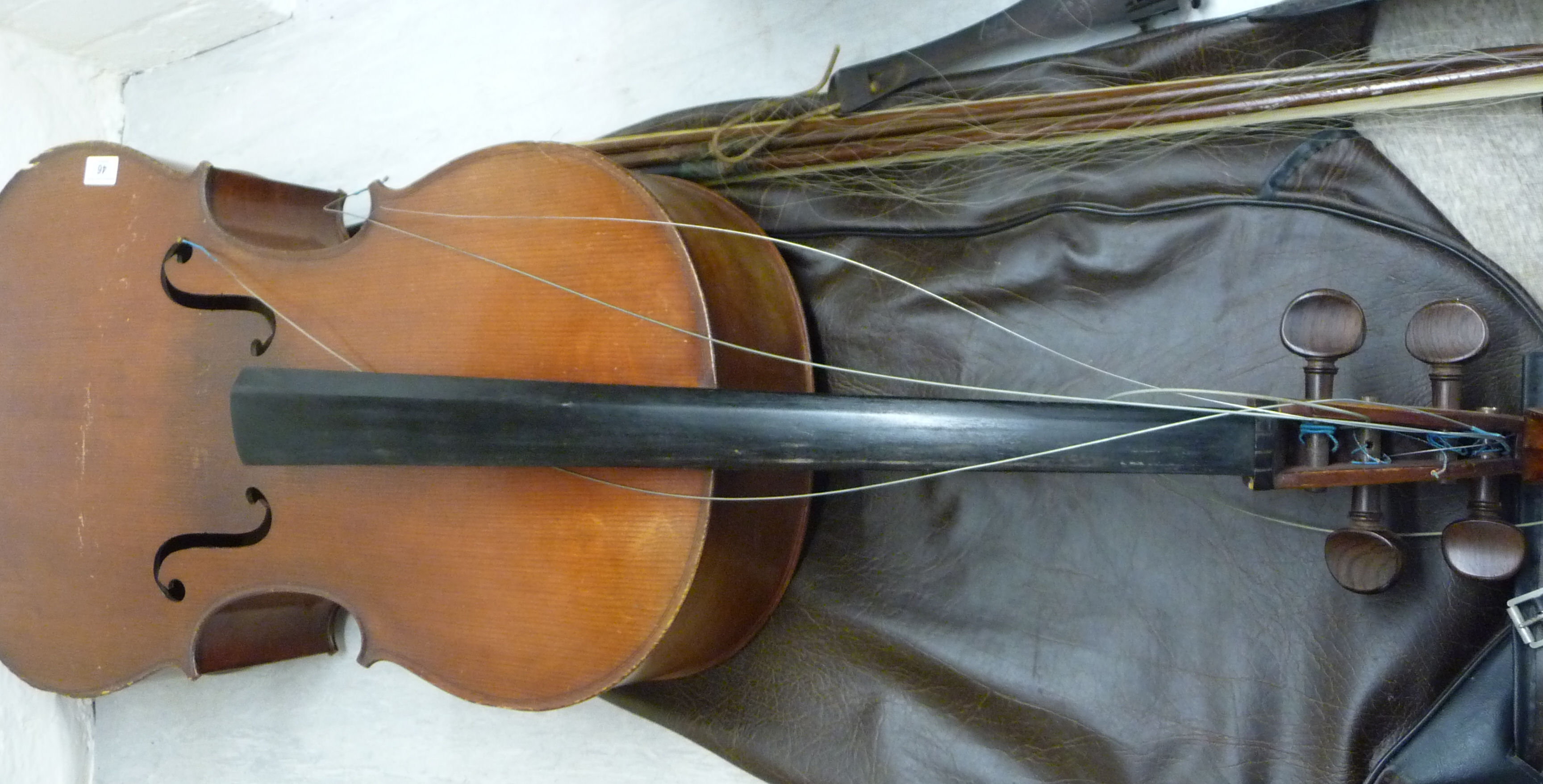 A Modern Cello With A One-piece Back 30''h With Three Bows BSR