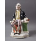 A 19th century Staffordshire figure of James Sadler, balloonist, 9 1/2" high, (small chips to base