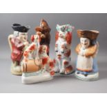 A 19th century Martha Gunn Toby jug, 9 1/4" high (restored), a similar snuff taking Toby jug, 9 1/4"
