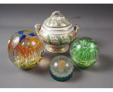 A Victorian green and gilt decorated sauce tureen and cover, a silver plated sauce ladle, and three paperweights 