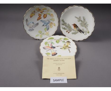 Ten Royal Worcester limited edition hand-painted collectors plates, "The Birds of Dorothy Doughty", and three others 