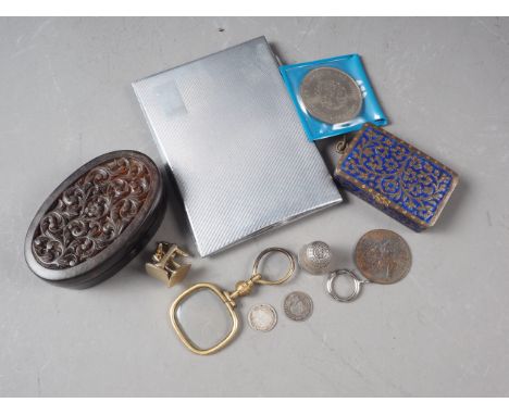 A carved tortoise shell oval snuffbox, a brass and enamel vesta, a magnifying glass, a pair of cufflinks and other items 