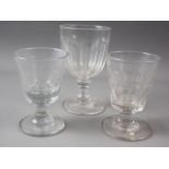 A 19th century glass goblet, 6 1/4" high, and two similar goblets
