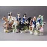 Two 19th century Staffordshire figures, "Tom King", a 19th century figure, "Dick Turpin", and a 19th