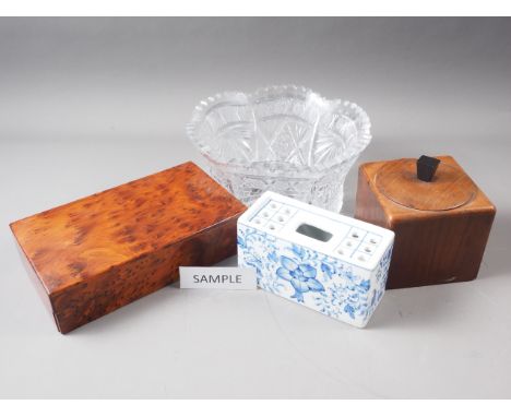 A maple cigar box, a wooden tea caddy, a wooden cased clock, a delft style flower brick, a cut glass fruit bowl, three table 