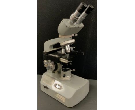 A Kyowa compound binocular microscope, no. 764949. 
