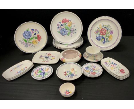 A quantity of Poole pottery including bowls, plates, trinket dishes etc 