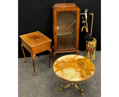 An agate topped circular coffee table, ornate brass tripod base, 46cm high x 69.5cm diameter;  a mid 20th century walnut art 