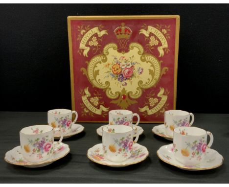 A set of six Royal Crown Derby ‘Derby Posies’ coffee cans and  saucers, first quality, boxed 