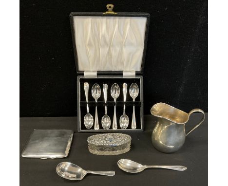 A silver cream jug, Deakin &amp; Francis, Birmingham 1943, cigarette case,  cased set six tea spoons, caddy spoon etc , 8.72 