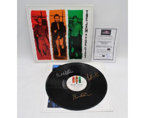 The Jam - 'The Gift' 12" vinyl record signed in person by Paul Weller, Bruce Foxton and Rick Buckler in 2006 at Virgin Radio 