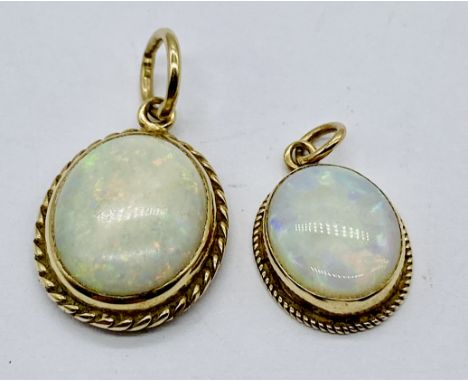 Two opal pendants, both set in 9ct gold