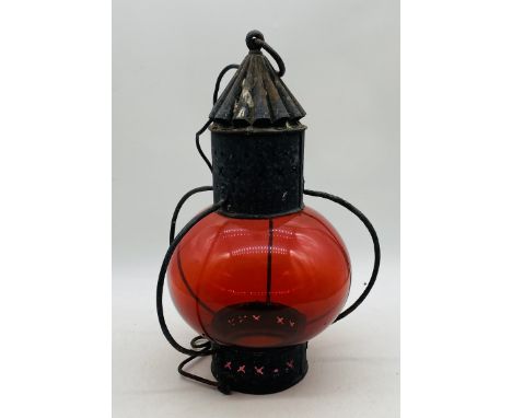 A vintage lantern style metal ceiling pendant with ruby red shade - overall height 48cm