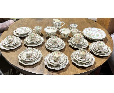 A Coalport "Indian Tree" part dinner service including teacups, saucers, side plates, milk jug, sugar bowls, dinner plates et