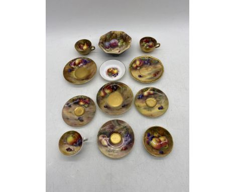 A collection of mis-matched hand painted Royal Worcester cups, saucers and dishes all decorated with fruit by various artists
