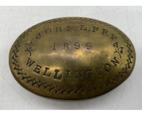 A Victorian brass snuff box named to John L Fry, Wellington, 1899
