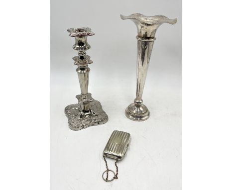 A collection of silver plated items including large trumpet vase, candlestick and cigarette case 