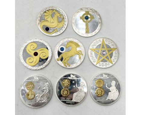 A collection of commemorative or proof medallions (possibly silver but untested) comprising of three celebrating the pre deci