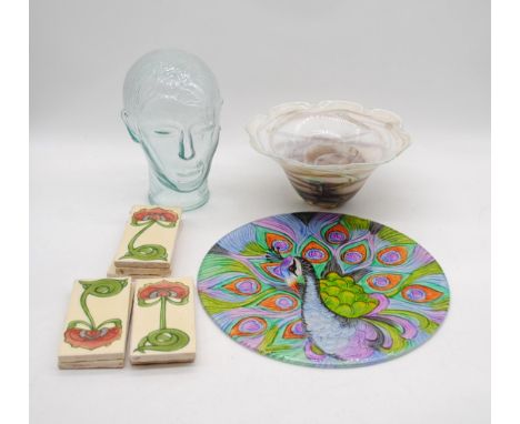 A collection of art glass, including a bowl with indistinct signature to base (possibly Shakespeare), a Peacock platter, a gl