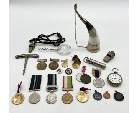 A collection of interesting items including Pakistan army service medals, ACME Scout Master whistle with compass, various com