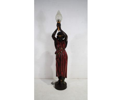 A 20th century large painted plaster figural standard lamp on pedestal base, in the Art Deco style after Delarue Picard (1885
