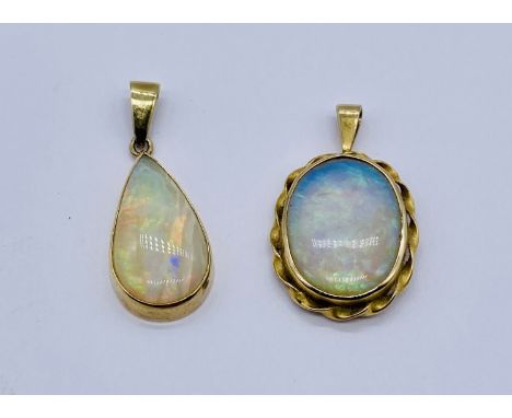 Two opal pendants both set in 9ct gold