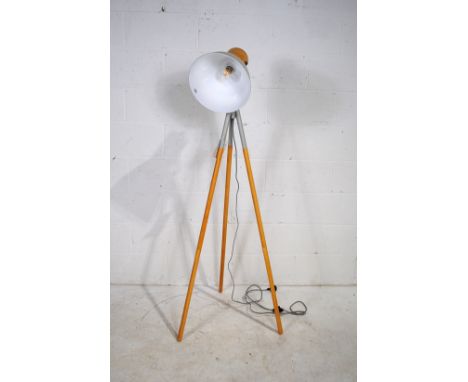 A contemporary floor lamp on tripod base - height 158cm