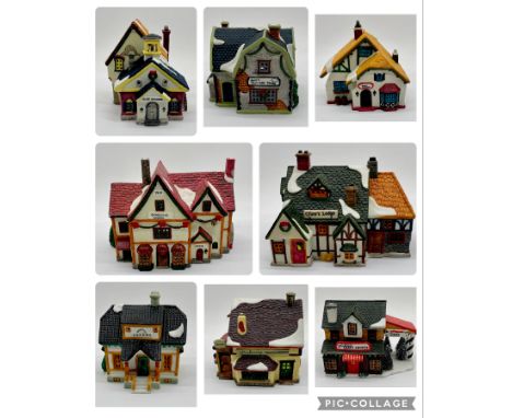 A collection of Lemax Christmas village/village collection houses etc some boxed, some with light fixtures