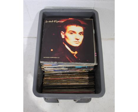 A large collection of mainly 80's 12" vinyl records, including Sinead O'Connor, Wham, Pet Shop Boys, Steve Arrington, Kylie M