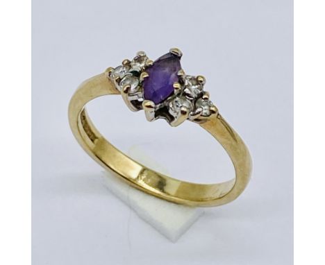 An amethyst dress ring set in 9ct gold. Size K 1/2