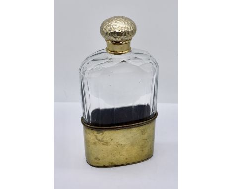 A Victorian cut glass hip flask with silver gilt stopper