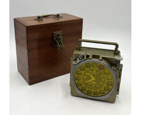 A vintage junior pigeon racing clock in wooden case