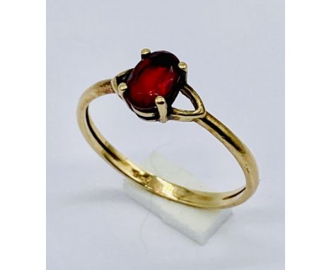 A 9ct gold gem set ring. Size K 1/2