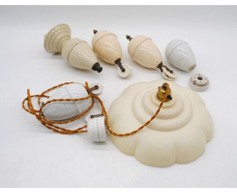 A vintage rise-and-fall light pendant, with various fixings - the bakelite shade marked 'Lumabel'
