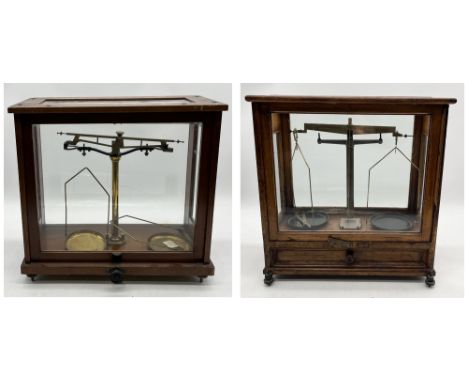 Two sets of cased scales an "ETA Junior" and one other